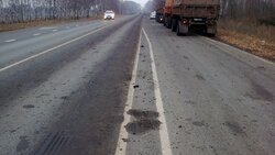 Белгородский водитель КамАЗа получил штраф за грязь на дороге